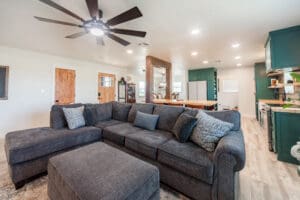 Modern living room with gray sectional sofa.