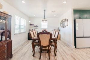 Elegant dining room with wooden furniture set.
