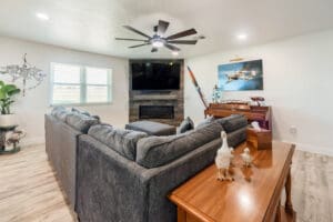 Living room with grey sectional sofa.