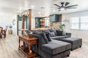 Modern open-concept living room and kitchen.