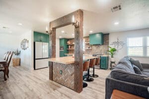 Open-plan kitchen and living room design.