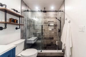 Modern bathroom with glass shower enclosure.